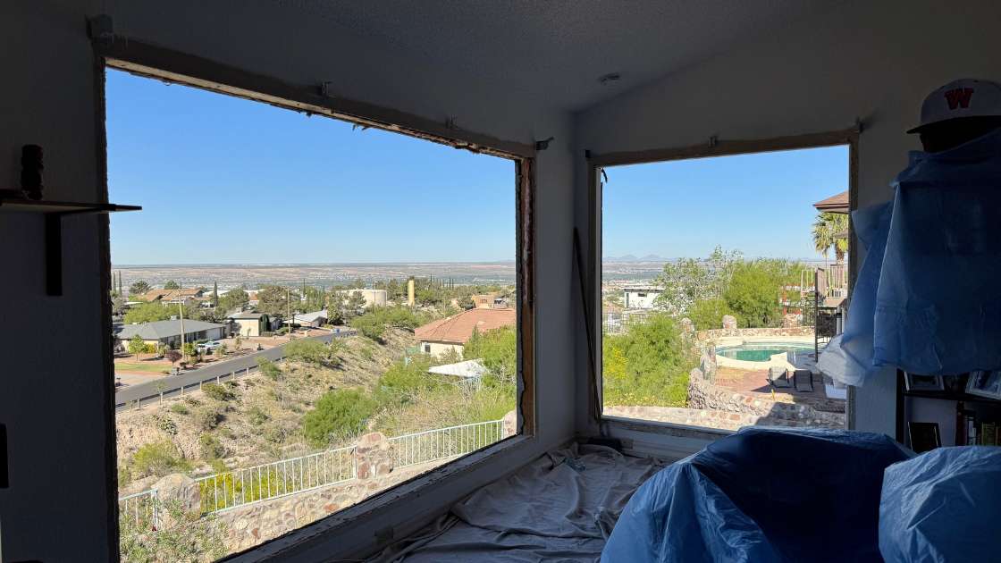 El Paso home with AC windows and doors prepared for summer comfort